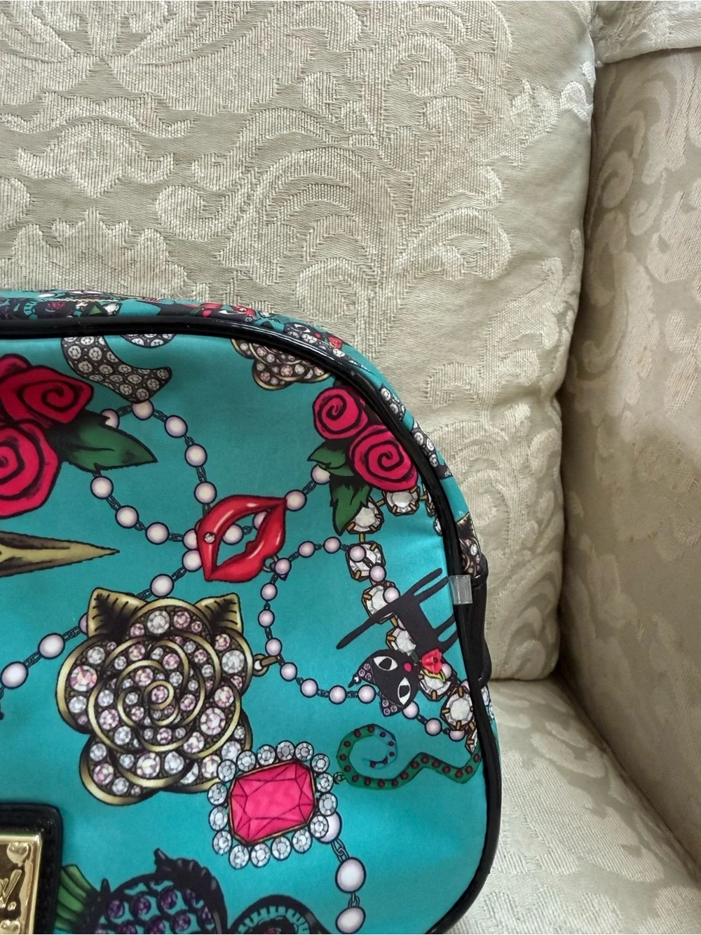 Betsey Johnson Teal Printed Cosmetic Case with Jewel & Rose Motif